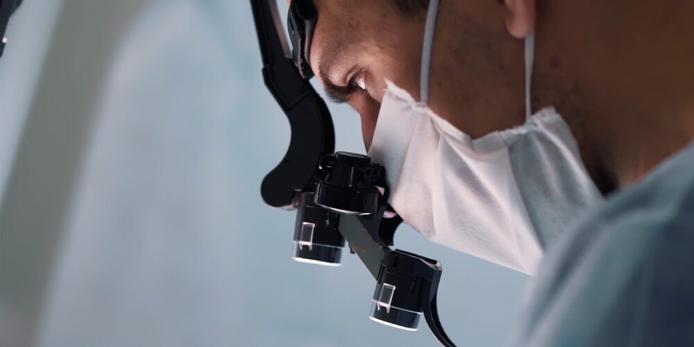 Close,Up,Of,Doctor,Face,With,Surgical,Loupe,,Sterile,Mask What to Expect During Your LASIK Surgery